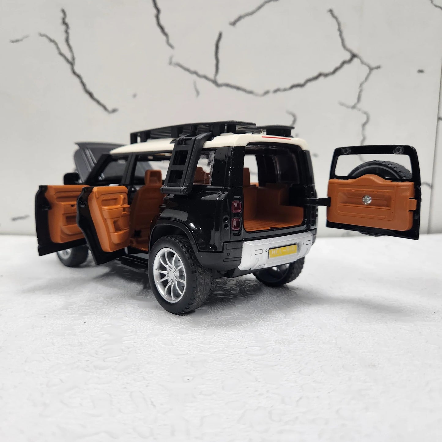 "Realistic RC Defender Diecast Model Car – Remote Control, Metal Body, Smoke Effect, Lights & Doors That Open!"